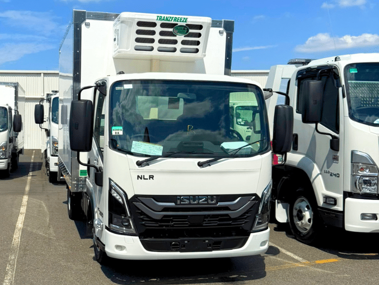 Isuzu NLR refrigerated truck with a Tranzfreeze body, front view