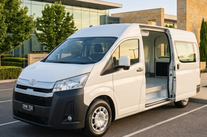 Refrigerated Toyota HiAce van parked with the side door open