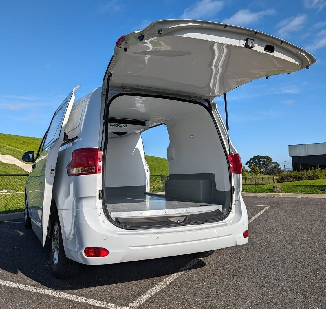 Refrigerated van with the rear tailgate open showing the chilled cargo area