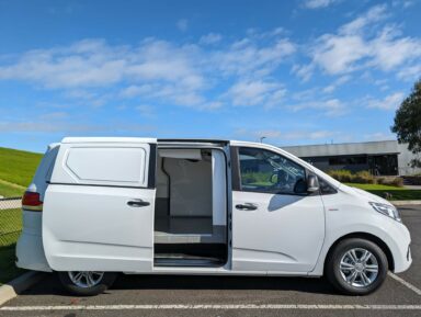 Refrigerated van parked with the sliding side door open