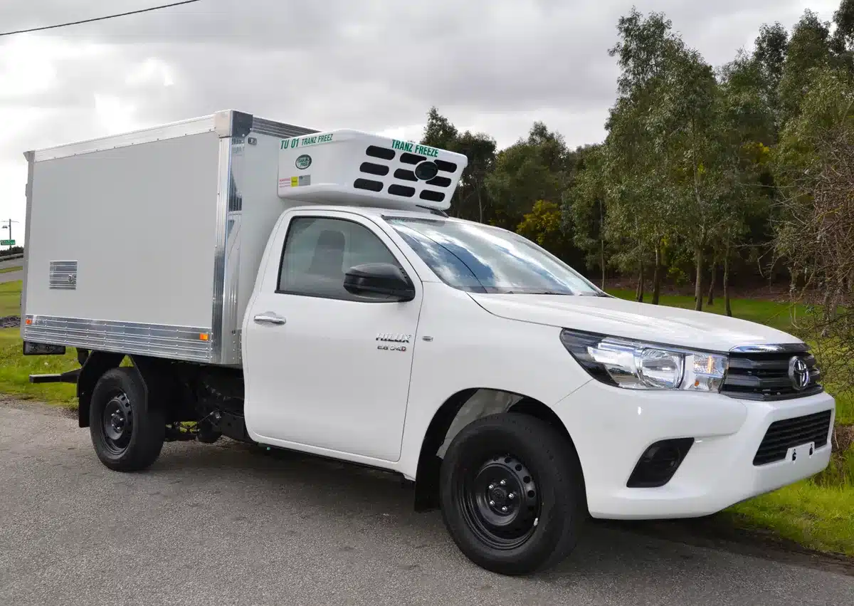 an image of white car truck tranzfreeze