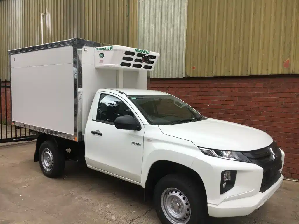 an image of white car truck tranzfreeze