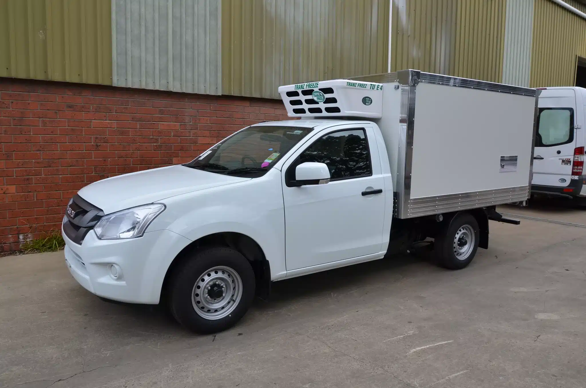 an image of white car truck tranzfreeze