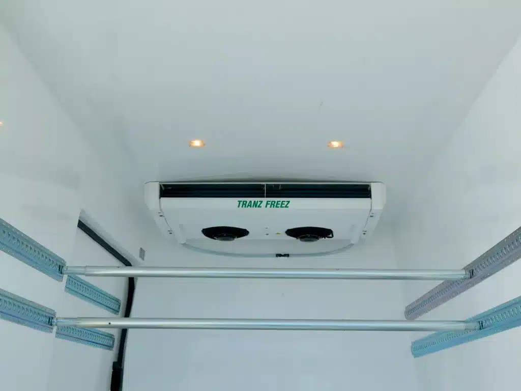 Ford Transit Jumbo refrigerated van interior with shoring bars