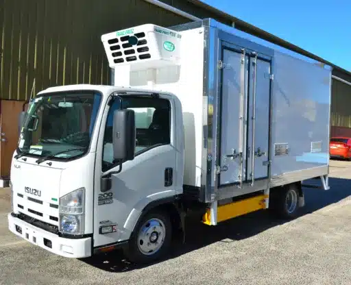 Isuzu truck with a Tranzfreeze refrigerated body and side doors