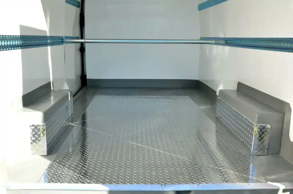 Centre checker plate floor in a refrigerated van body