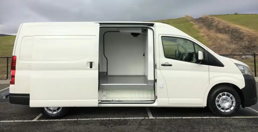 Refrigerated van with the sliding side door open showing the insulated cargo area