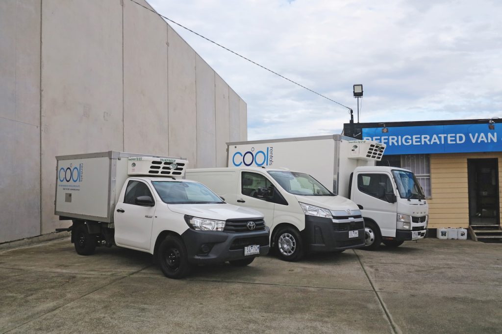 Three Cool Rentals refrigerated vehicles fitted by Tranzfreeze parked outside the Cool Rentals workshop